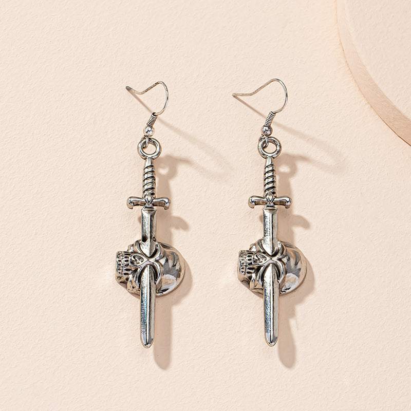 Guess Who Skull Dagger Earrings