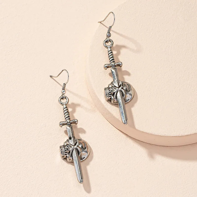 Guess Who Skull Dagger Earrings